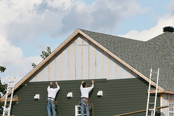 Professional Storm Damage Siding Repair technician working in Kingston, PA